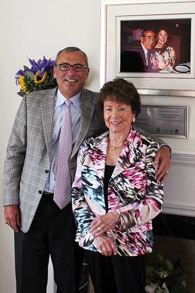 lois davis standing with an older man